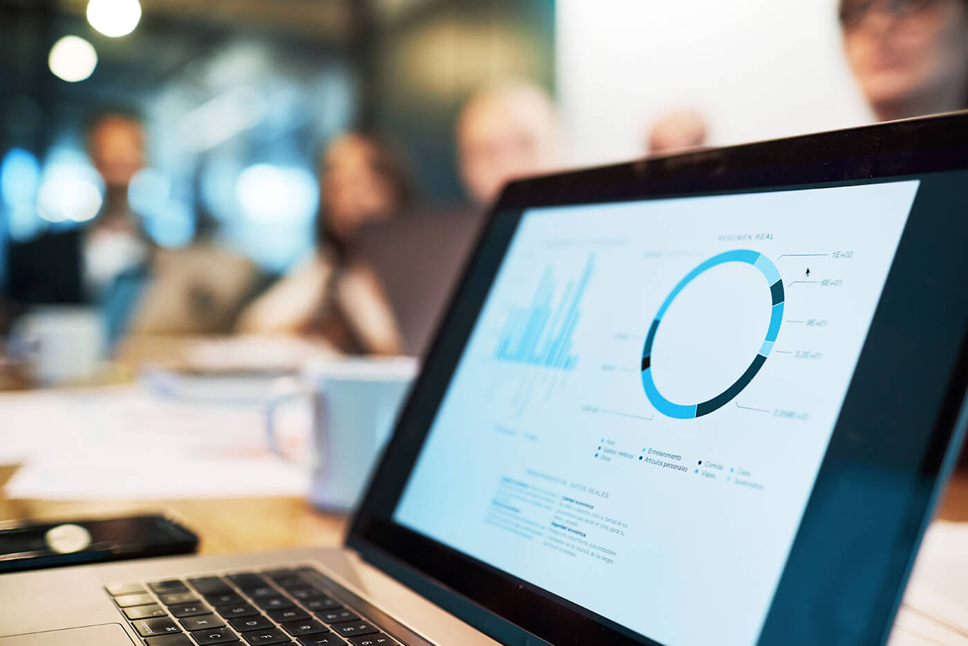 The computer presents a digital interface that illustrates networking and optimisation through modern technology.